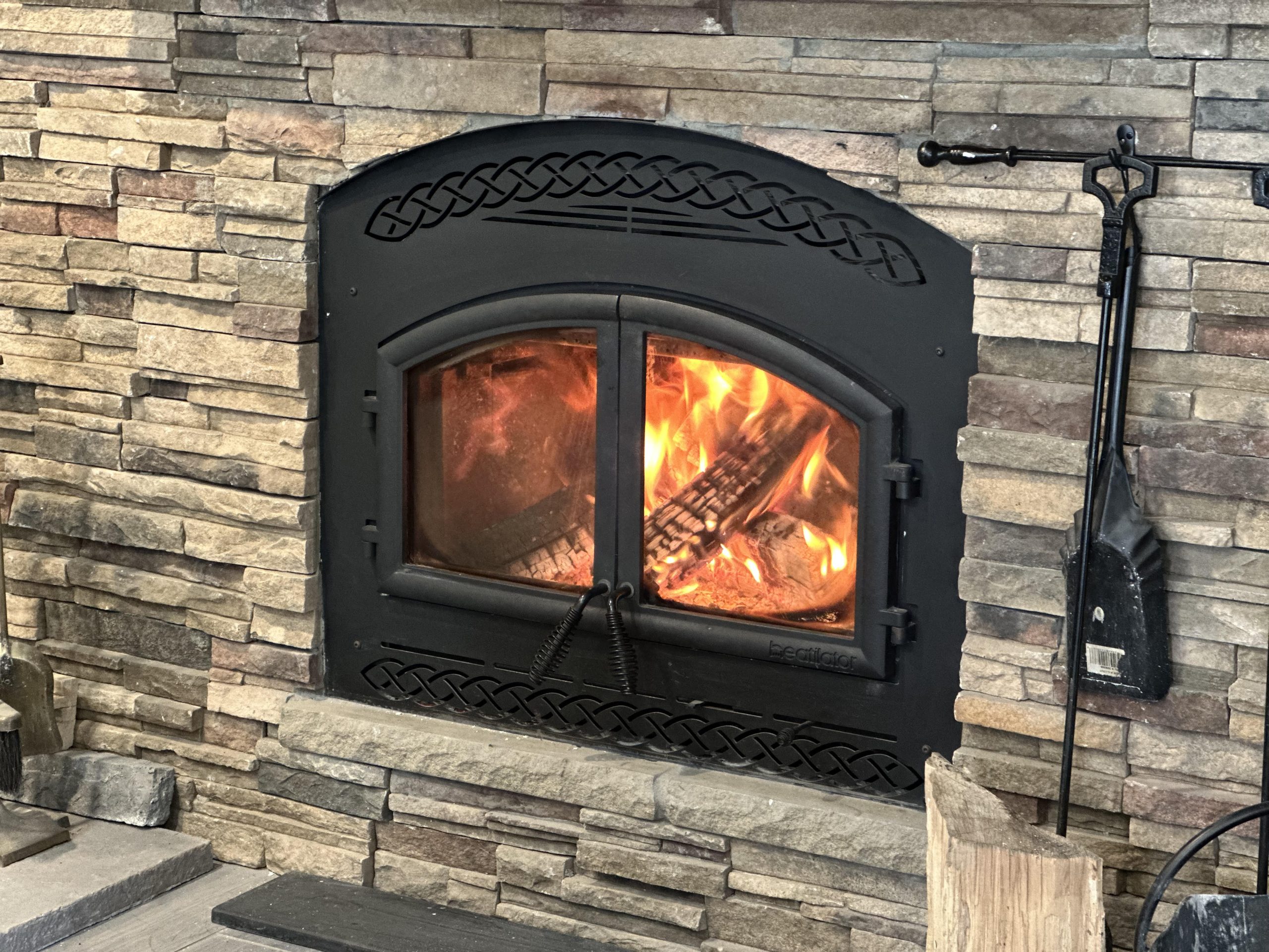 What is the difference between a natural wood fireplace and a wood